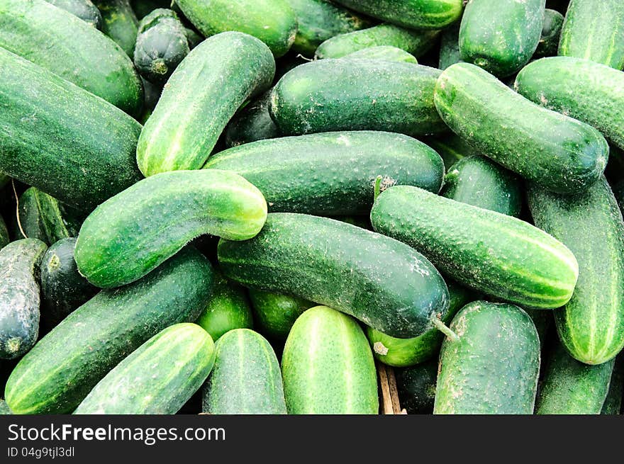 Cucumbers background on the green market