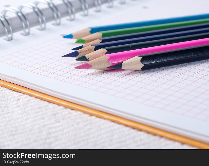 Paper And Pencils On The Table