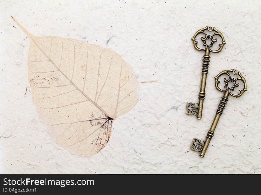 Antique keys on handmade rice paper