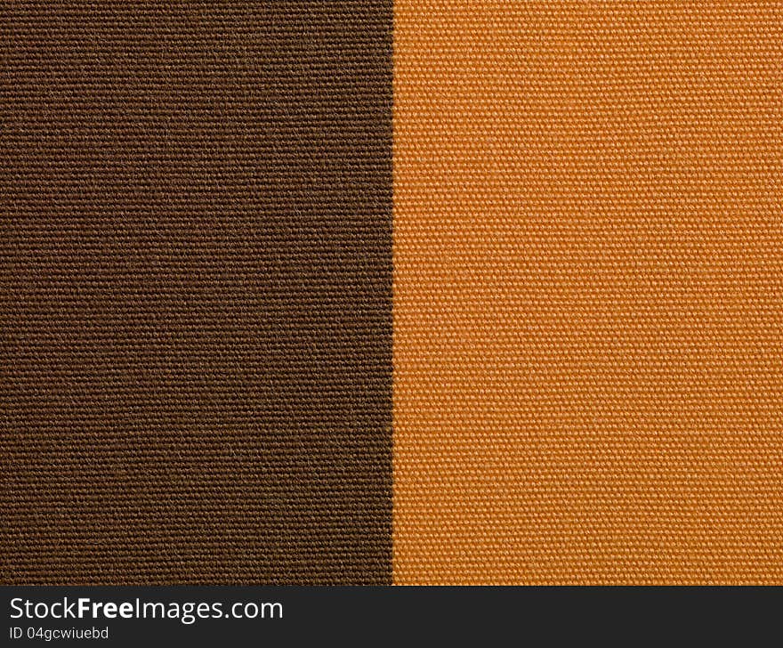 Brown and orange fabric texture macro retro detail