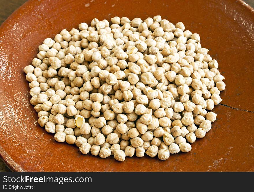 Chickpeas in old ceramic plate