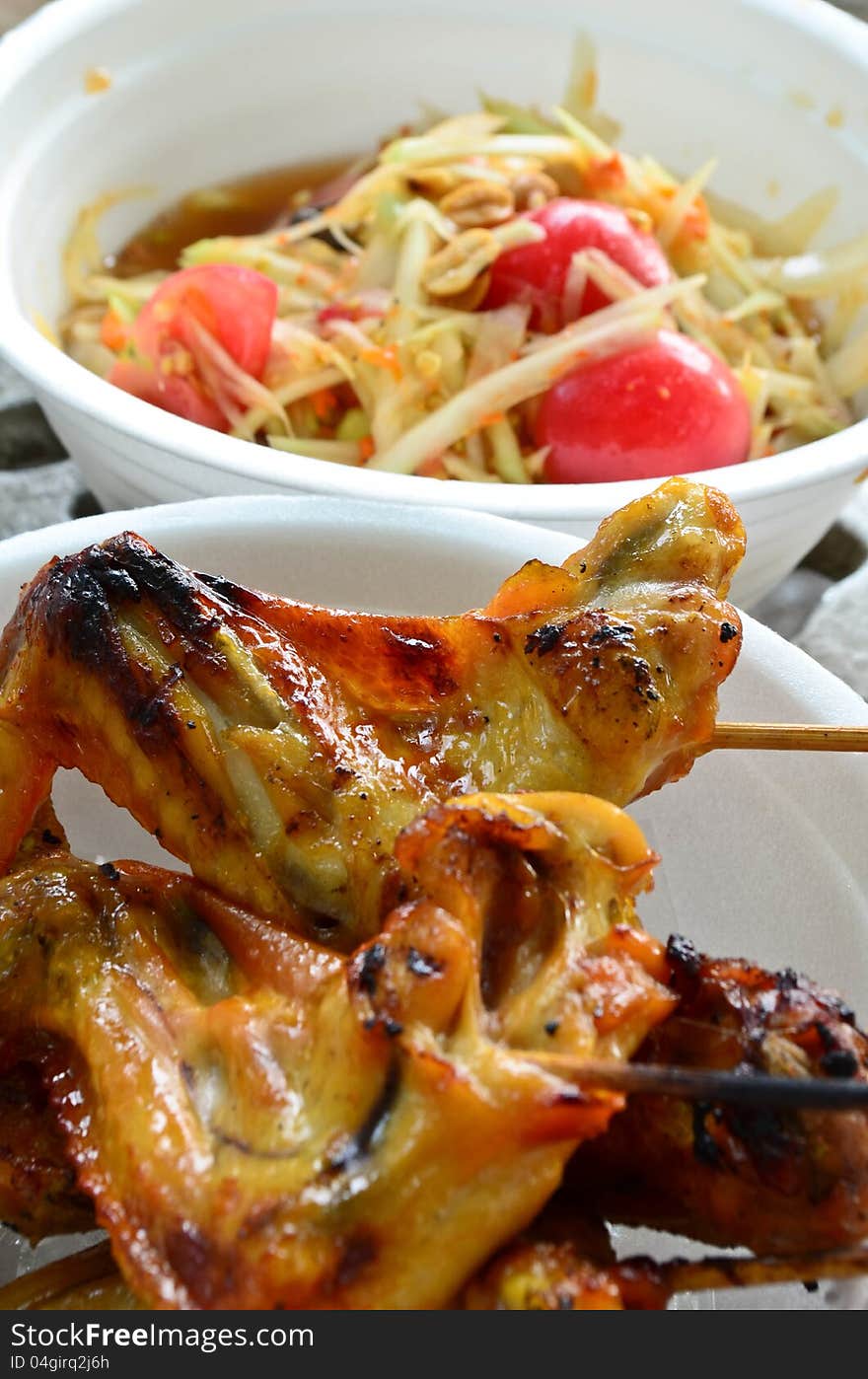 Spicy papaya salad & Grill Chicken, Thai style food