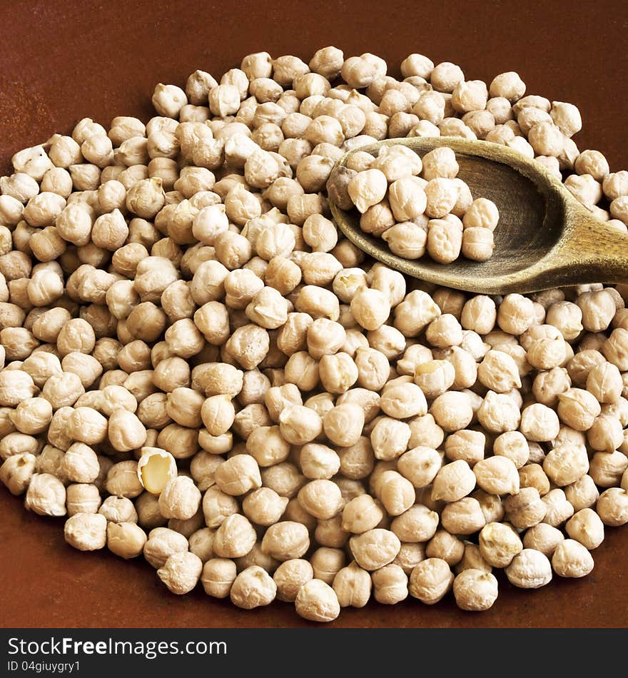 Chickpeas with wooden spoon