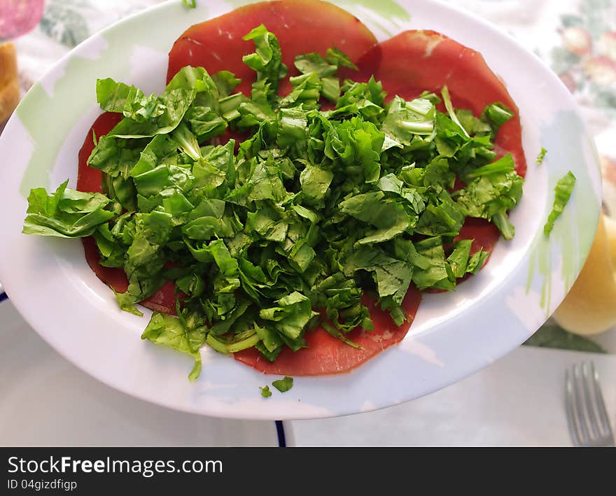 Italian bresaola and green chicory