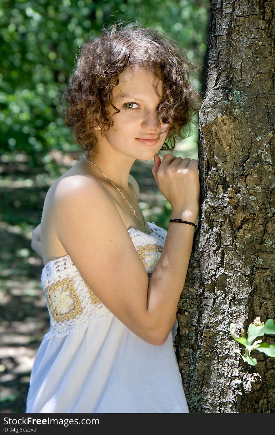 Portrait of a beautiful and sensual girl in the woods