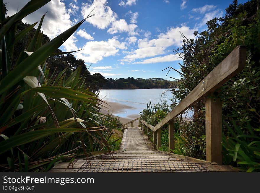 Steps on the coastline leading down to a beach. Steps on the coastline leading down to a beach.