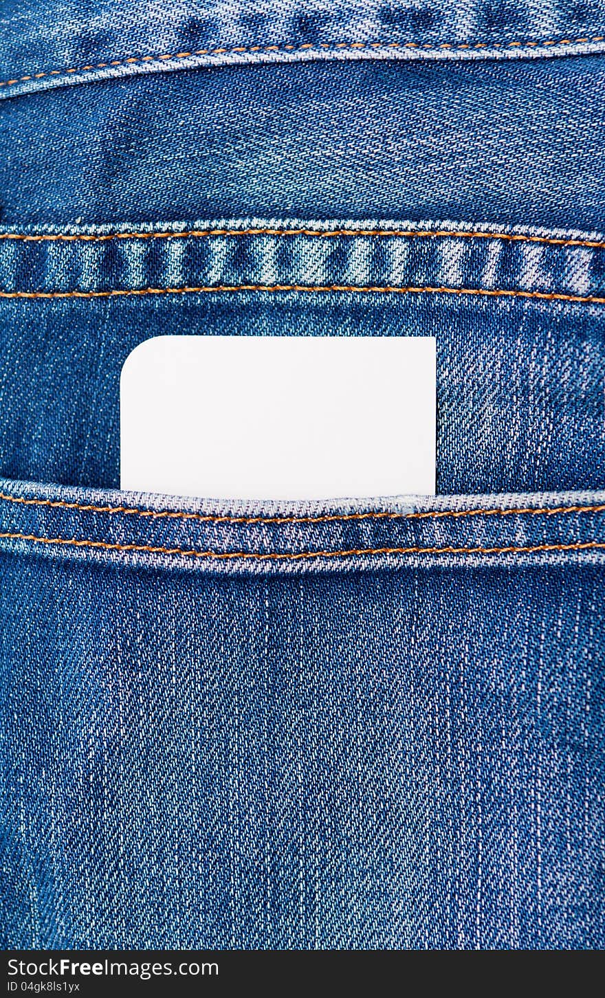 Blank white card peeking out of a rear denim jeans pocket ready for your message or text. Blank white card peeking out of a rear denim jeans pocket ready for your message or text