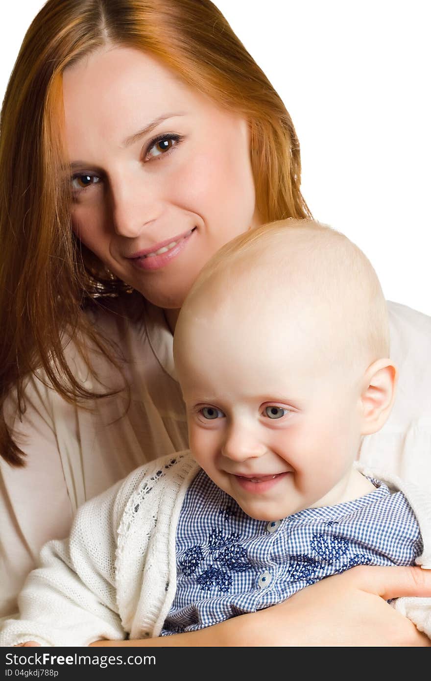 Portrait of mother holding child .