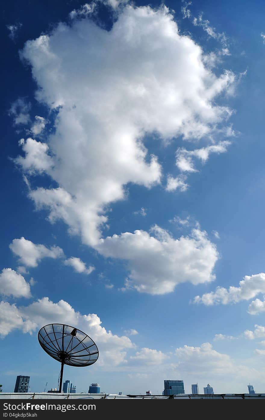 Satellite on clouds blue sky  in bangkok