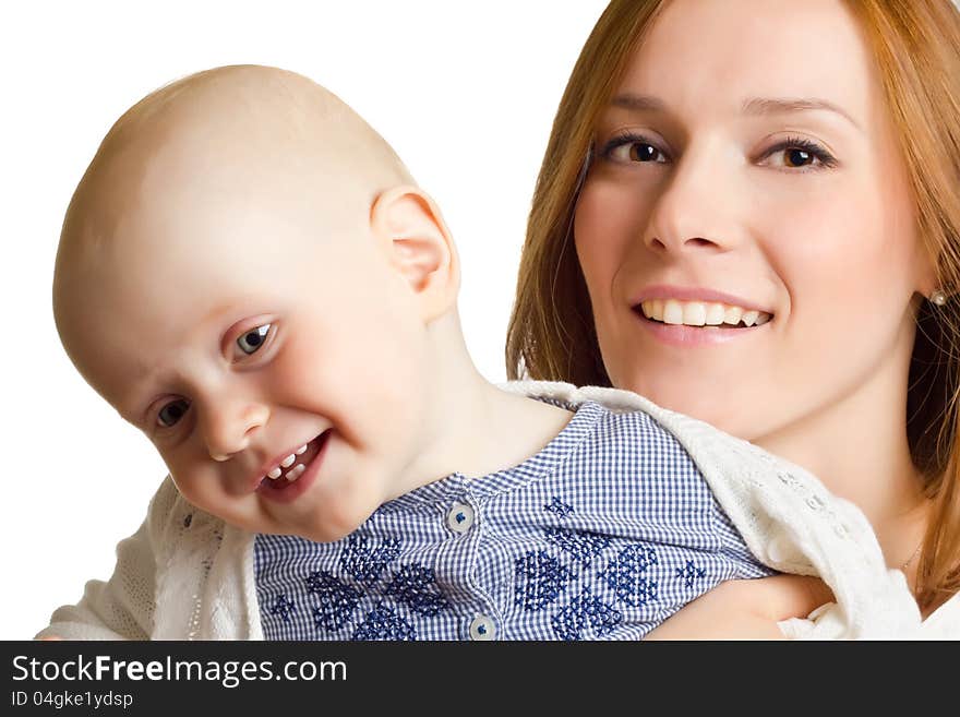 Portrait of happy mother with baby in her arms. Portrait of happy mother with baby in her arms.