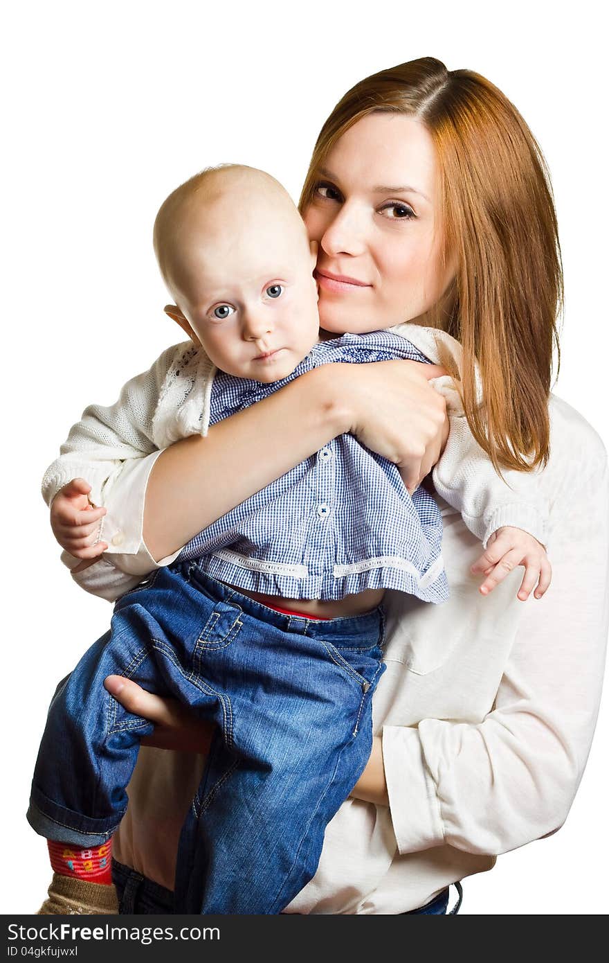 Portrait of mother holding child.