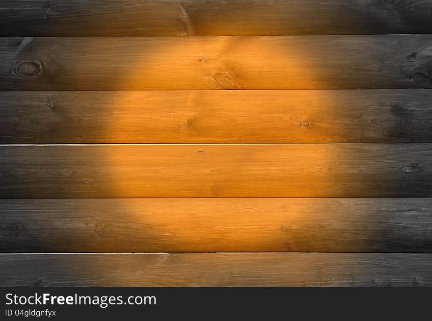 A natural wood background with a spotlight. A natural wood background with a spotlight