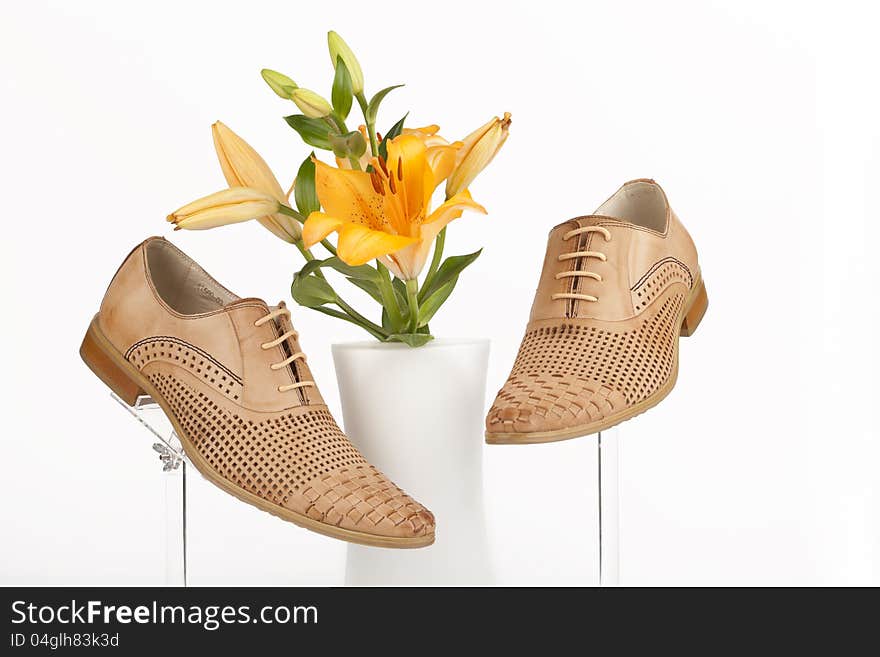 Men shoes with rose on white background