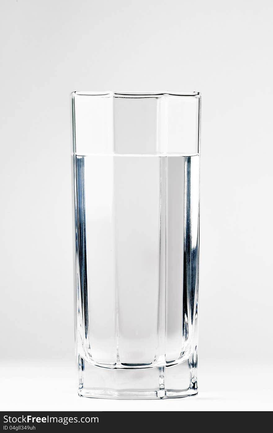 With A Glass Of Water On A White Background