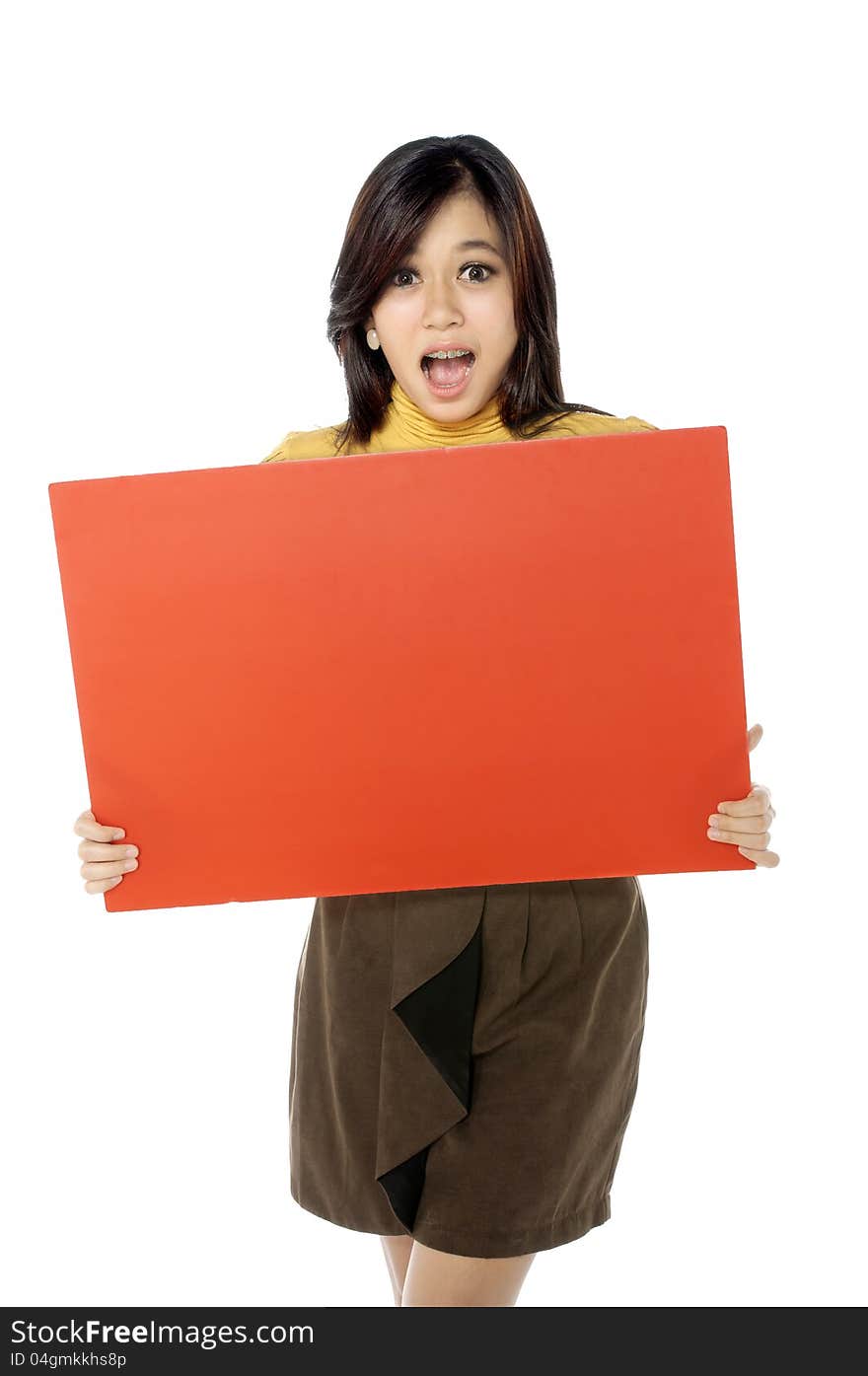 Beautiful woman hold blank red banner isolated over white background. You can put your message on the banner. Beautiful woman hold blank red banner isolated over white background. You can put your message on the banner