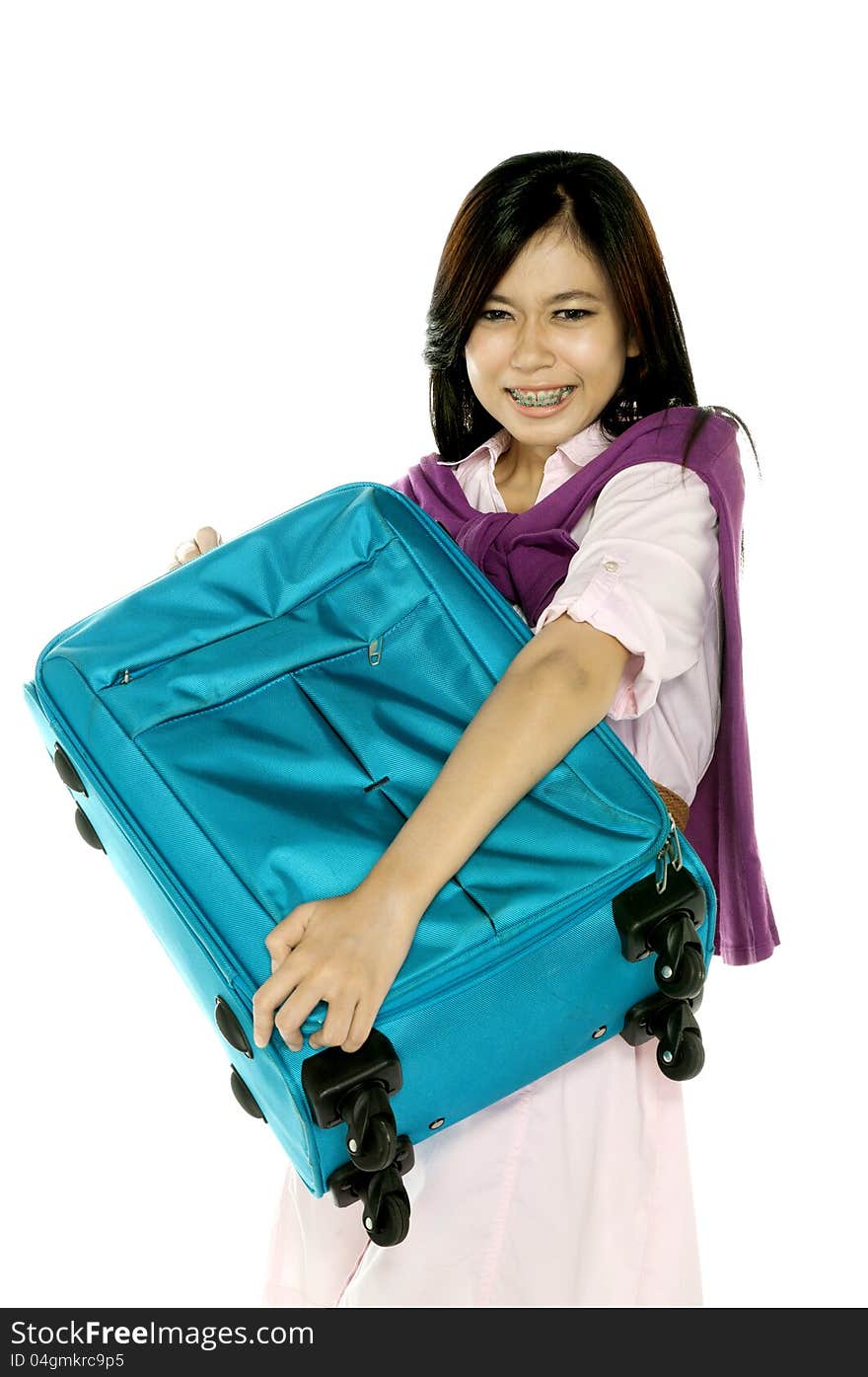 Beautiful woman stress because bring heavy travel bag. Beautiful woman stress because bring heavy travel bag