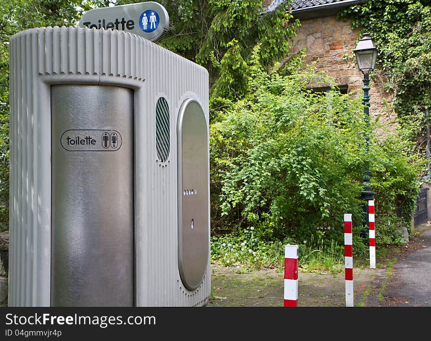 Modern automatic self cleaning, pay for use public toilet in the Park. Modern automatic self cleaning, pay for use public toilet in the Park