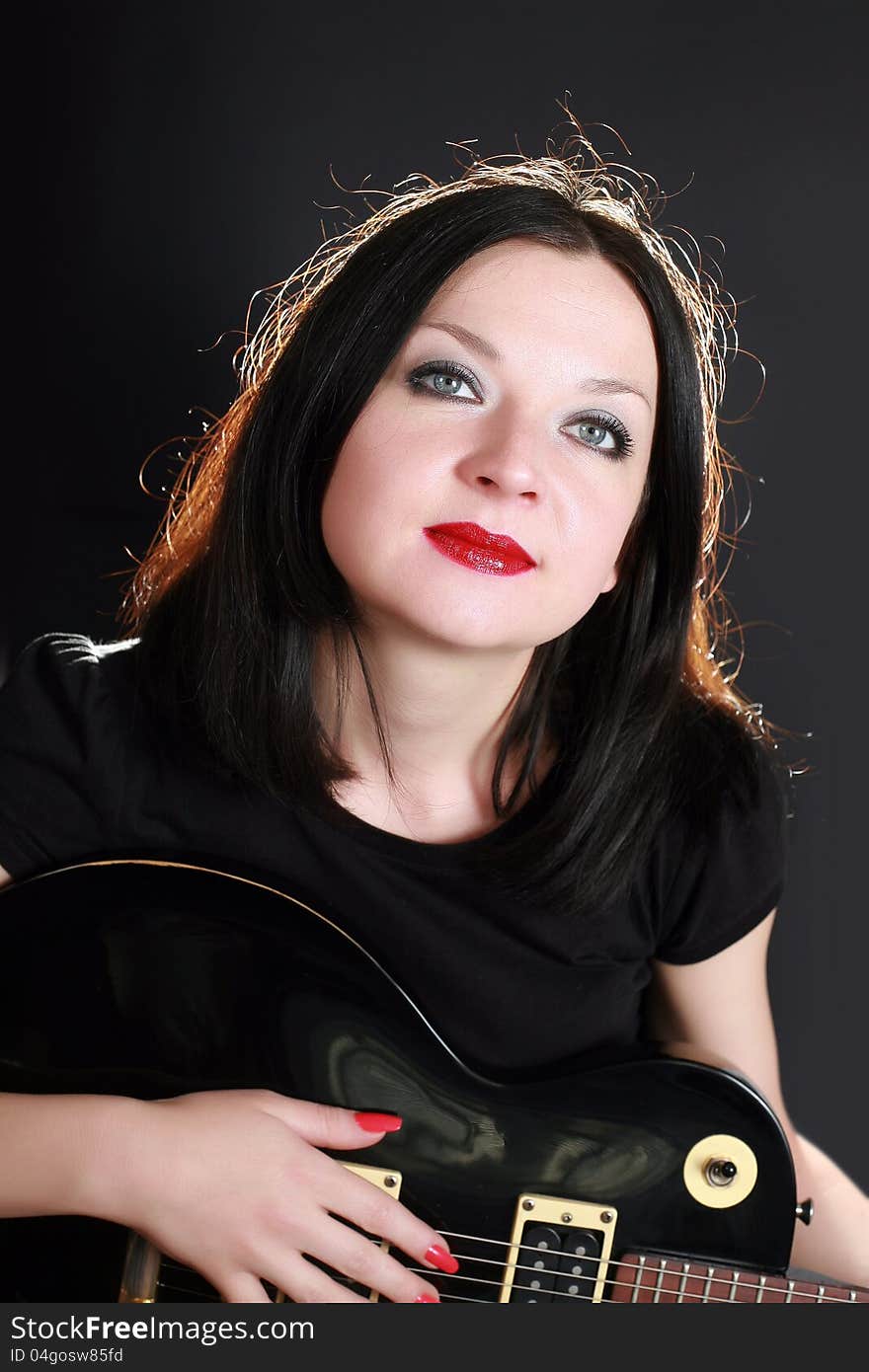 Pretty girl and a guitar