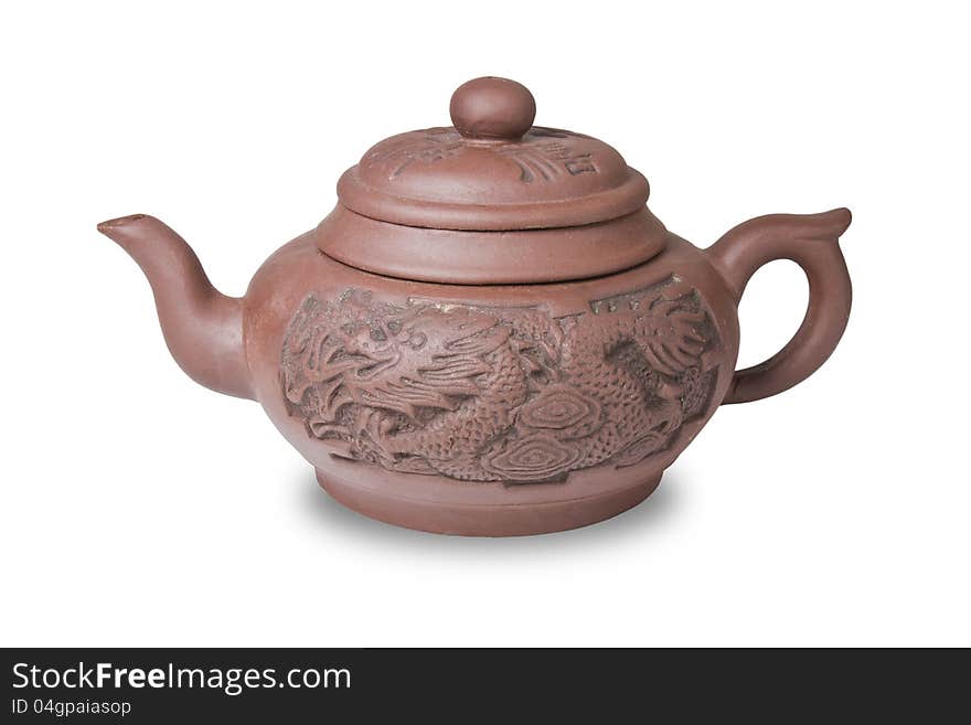 Earthenware teapot on white background with clipping path. Earthenware teapot on white background with clipping path