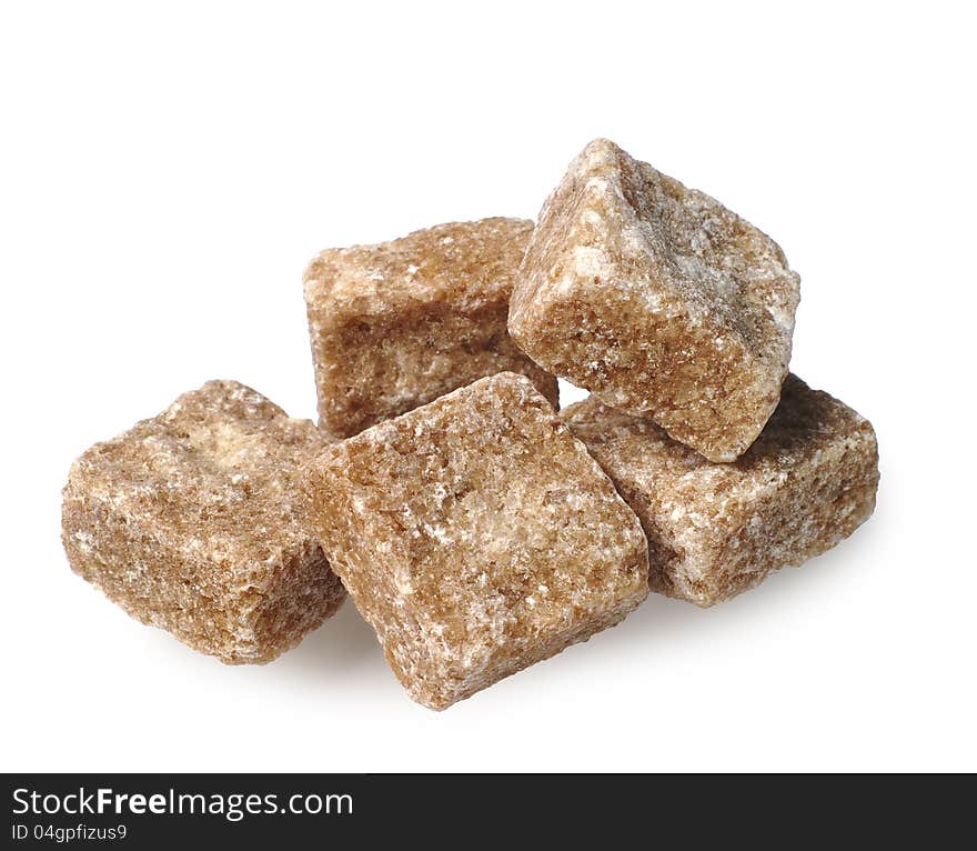 Cane sugar cubes on a white background