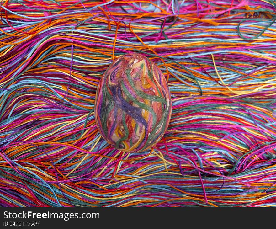 Vivid silk colored thread on a table. Vivid silk colored thread on a table