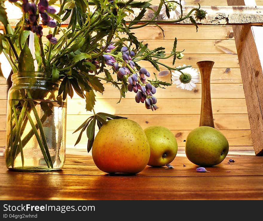 Apples on a timber floor