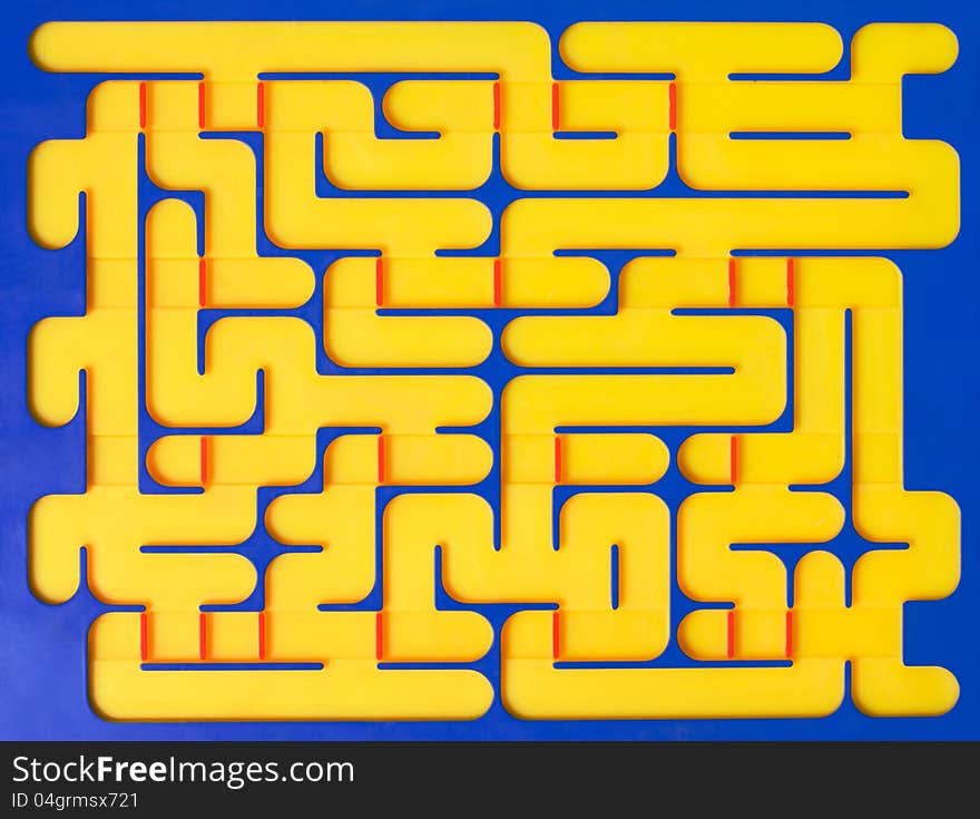 Maze toy, plastic yellow on blue labyrinth