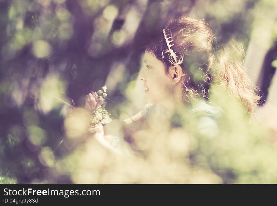 Retro style picture of a girl with flowers