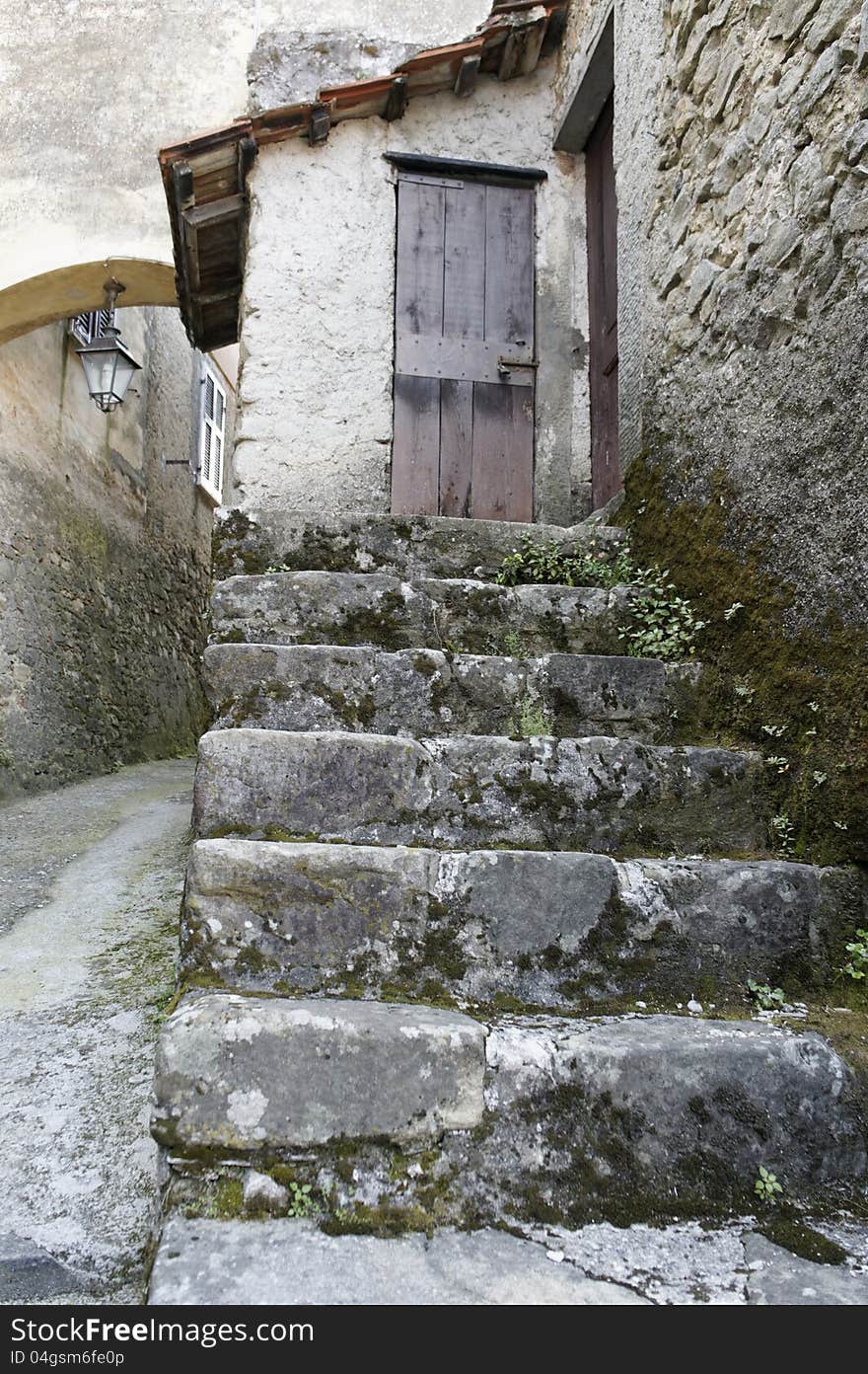 Detail of old stairs in a village