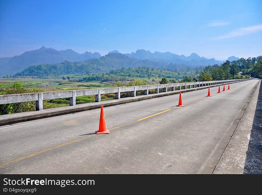 Country road  with moutain background.