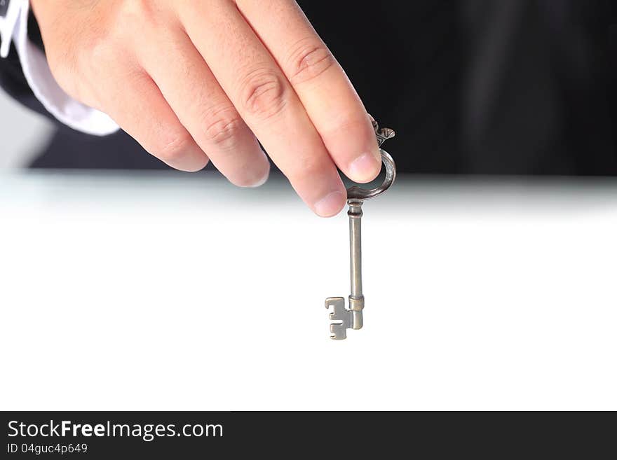 Businessman holding the key, The key concept of success. Businessman holding the key, The key concept of success