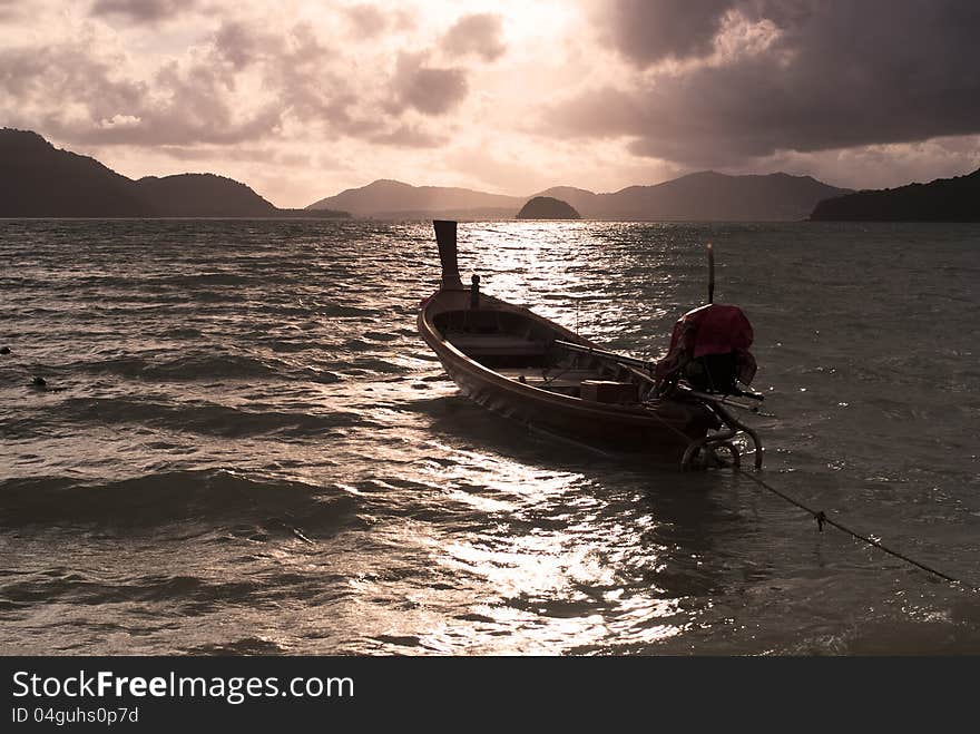 Silhouette of a boat in the sea at sunset. Silhouette of a boat in the sea at sunset