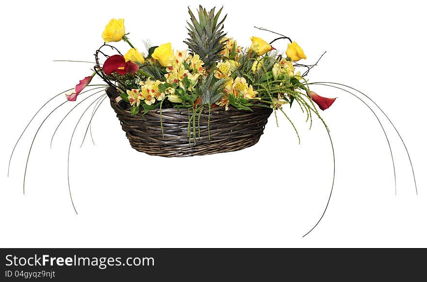 A large floral arrangement in a wicker basket