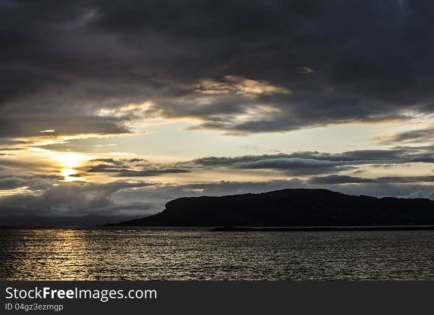 Evening sun above trondheims fjord. Evening sun above trondheims fjord