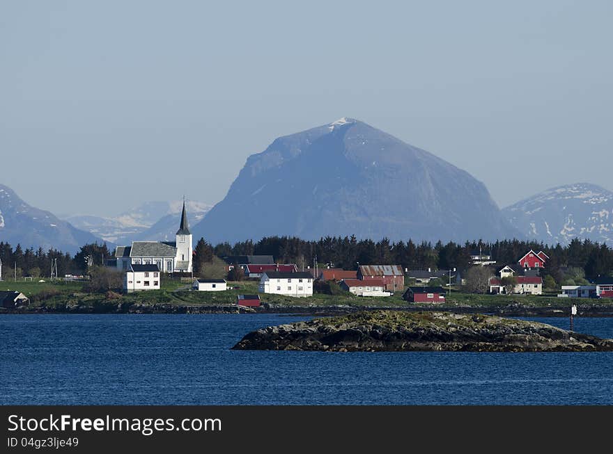 Small village with mountains behind. Small village with mountains behind