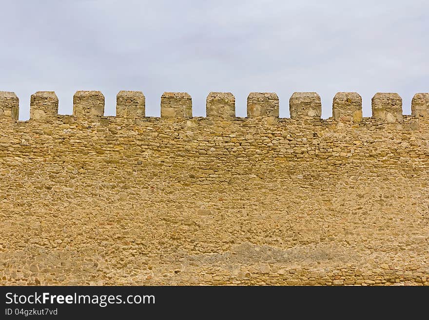 Ancient stone wall of a fortress. Ancient stone wall of a fortress.