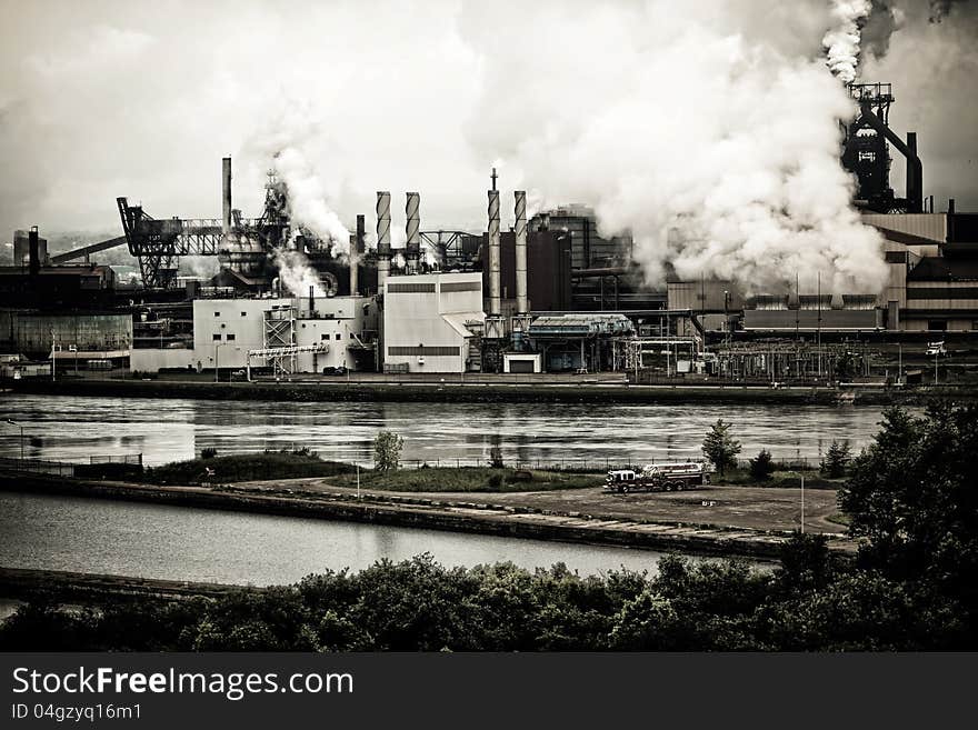 A picture of the pollution that comes from the local steel plant. Note: you are not allowed to smoke cigarettes anywhere on the property. Hypocrites!. A picture of the pollution that comes from the local steel plant. Note: you are not allowed to smoke cigarettes anywhere on the property. Hypocrites!