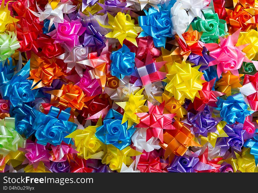 Ribbon wrapped coins.Packages of ribbon. Ribbon wrapped coins.Packages of ribbon