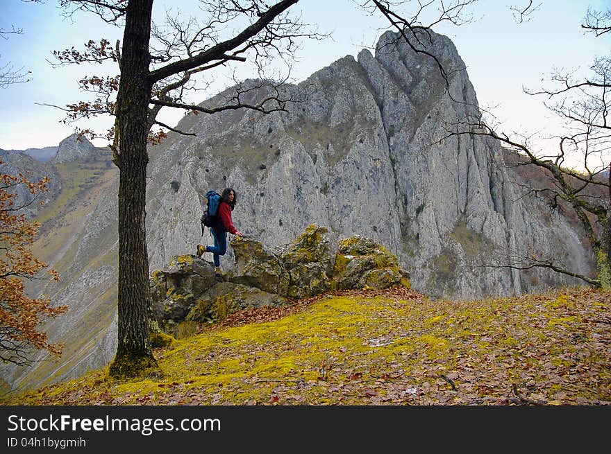 Beautiful limestone gorge and a woman admiring it