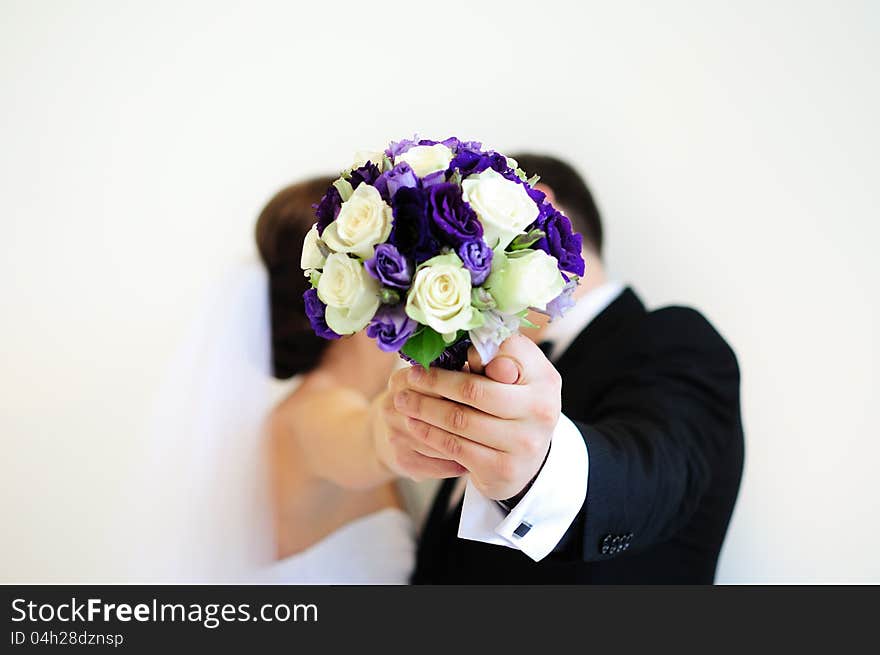 Wedding bouquet with fig. Blur white background