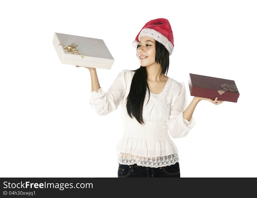 Woman wearing santa hat hold gift box isolated over white background. Woman wearing santa hat hold gift box isolated over white background