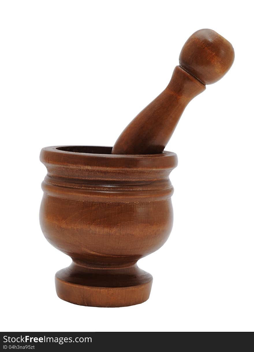 Brown wooden mortar with a pestle for the kitchen. Brown wooden mortar with a pestle for the kitchen