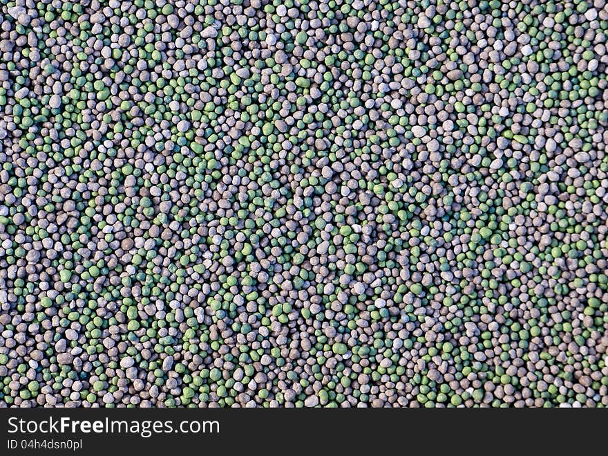 Texture of green and brown pebbles. Texture of green and brown pebbles.