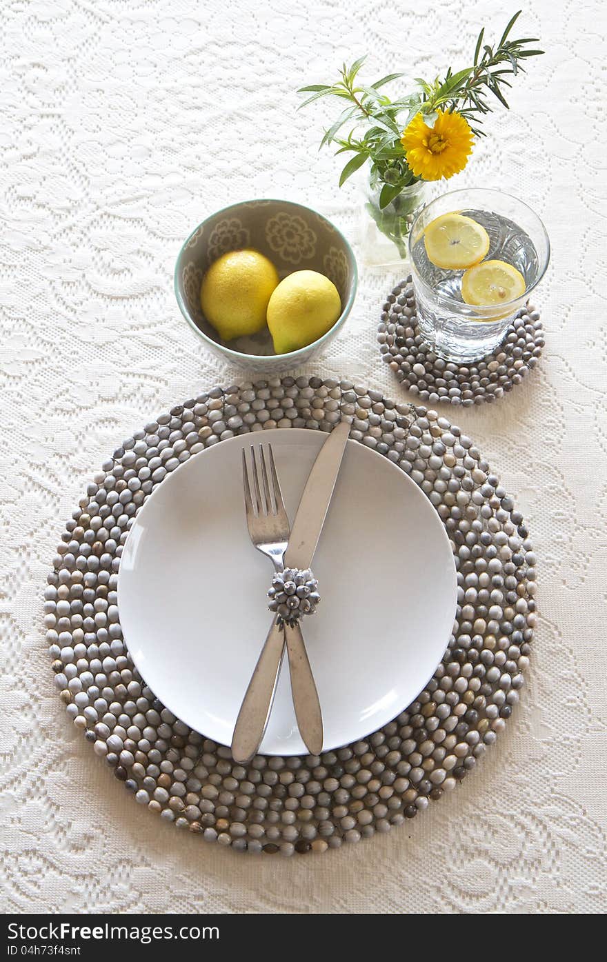 Table place setting with beaded mats