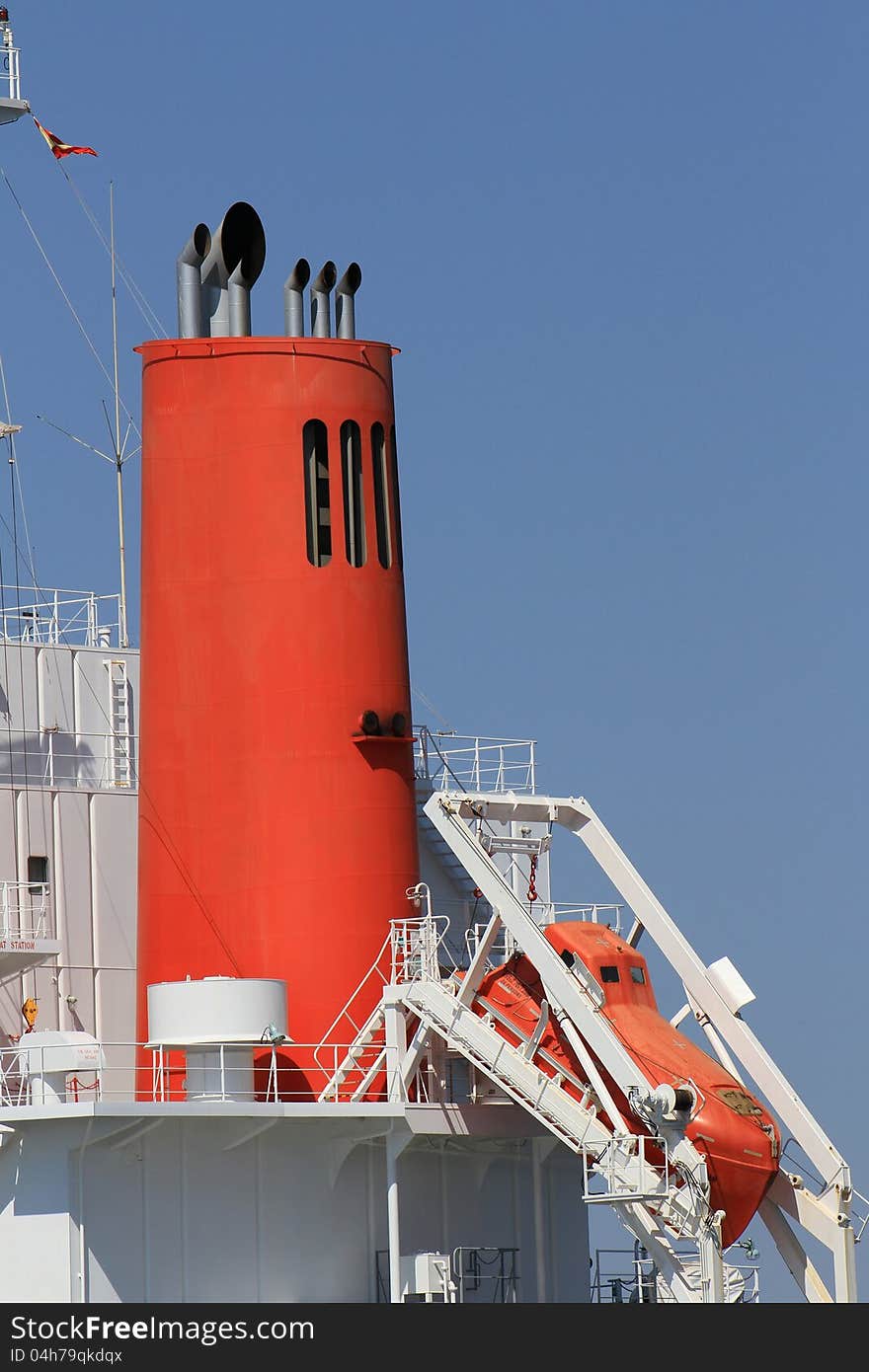 Rescue boat and big howl of a bull-carrier. Rescue boat and big howl of a bull-carrier