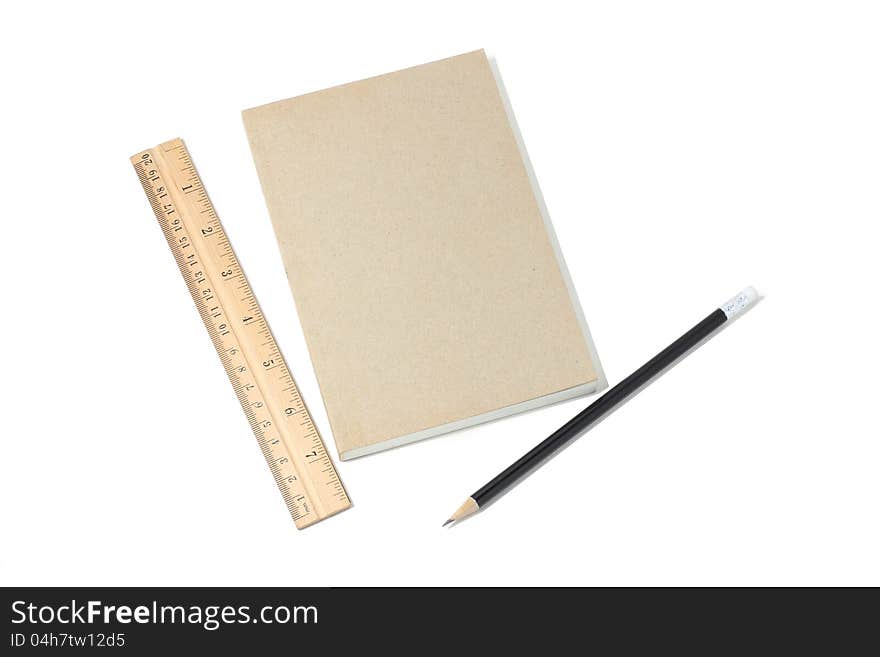 Book, Ruler and pencil on white background