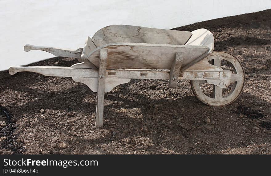 A Traditional Vintage All Wood Gardeners Wheelbarrow.