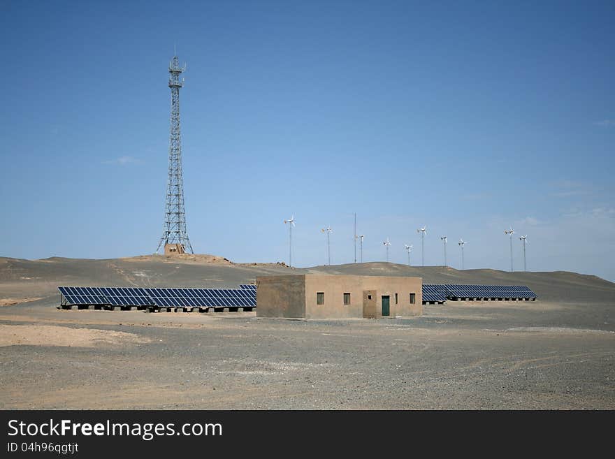 Wind turbines and solar panels in Gobi desert, Dunhuang China