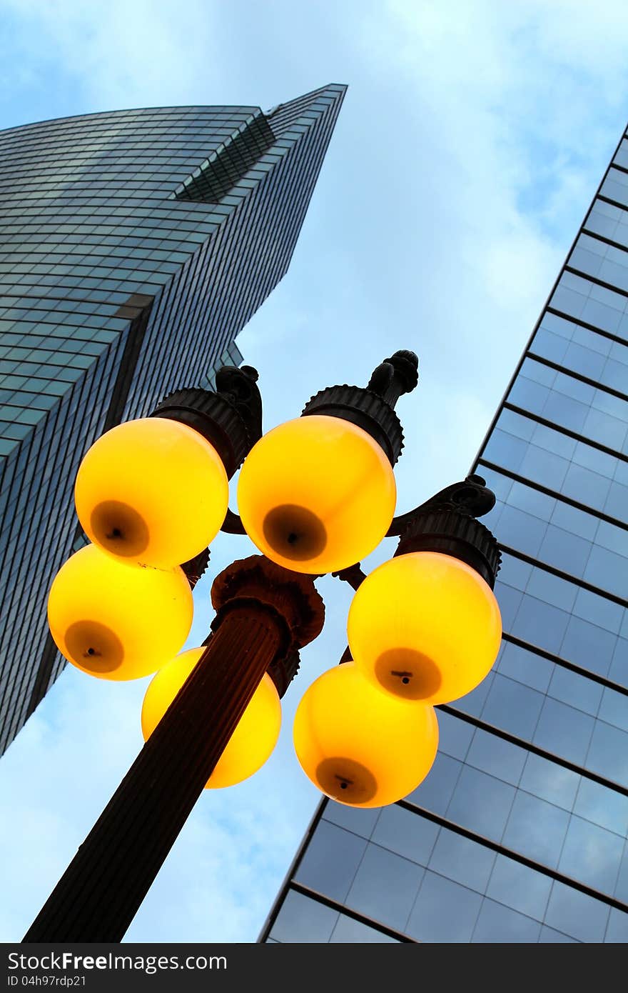 Street lamp and skyscrapers