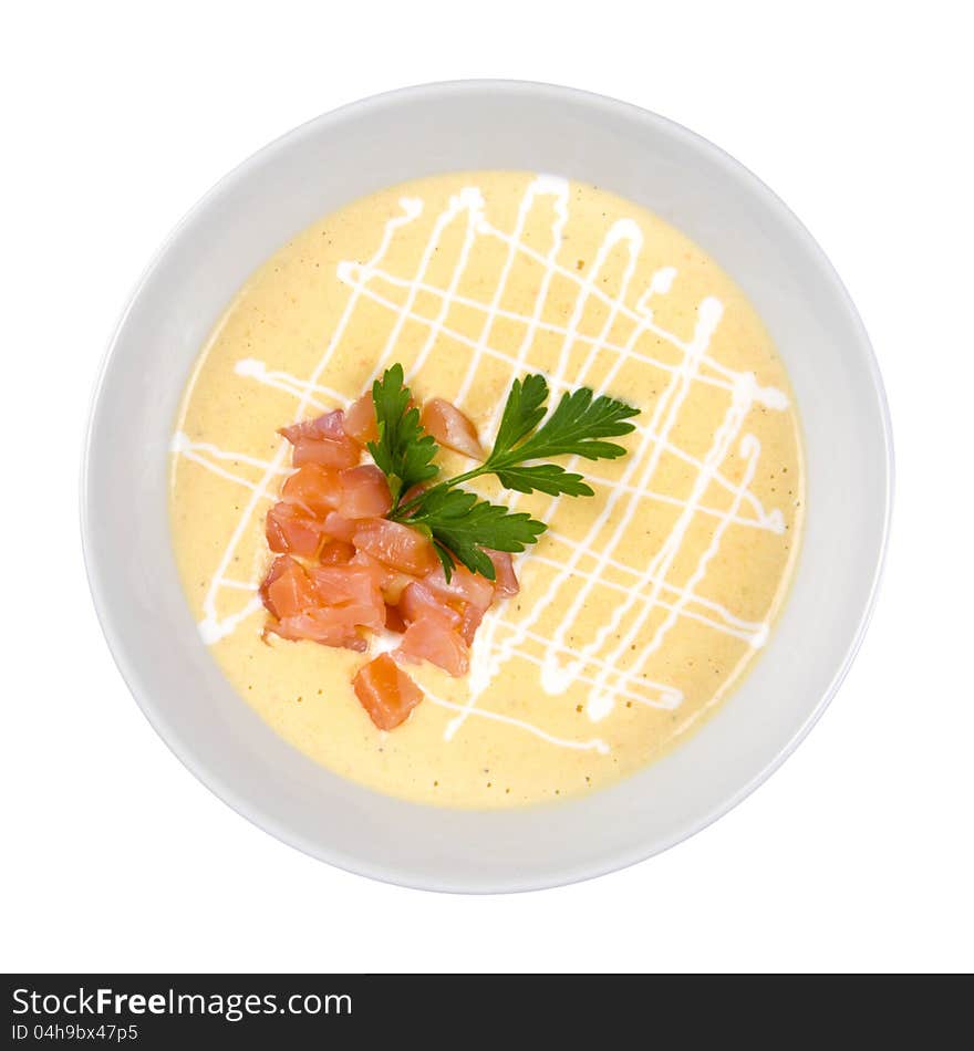 Bowl of creamy soup with salmon